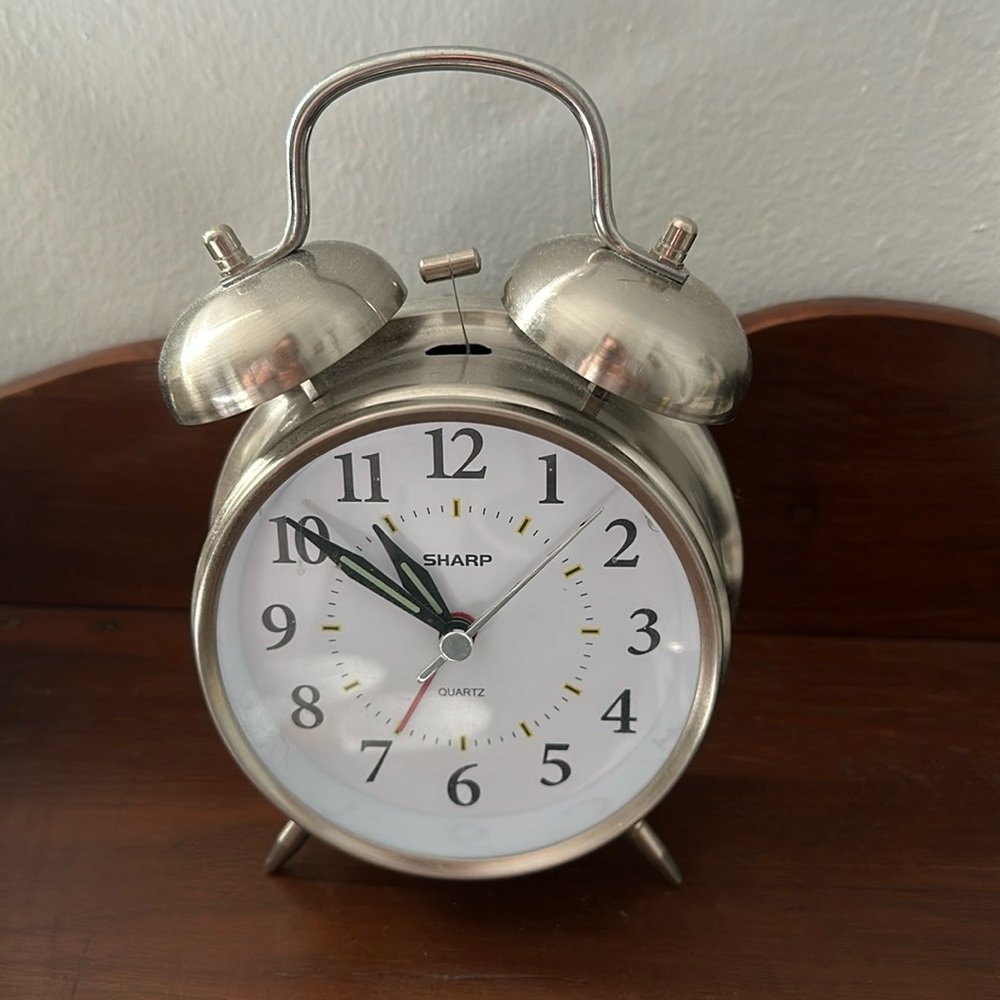 Battery powered alarm clock